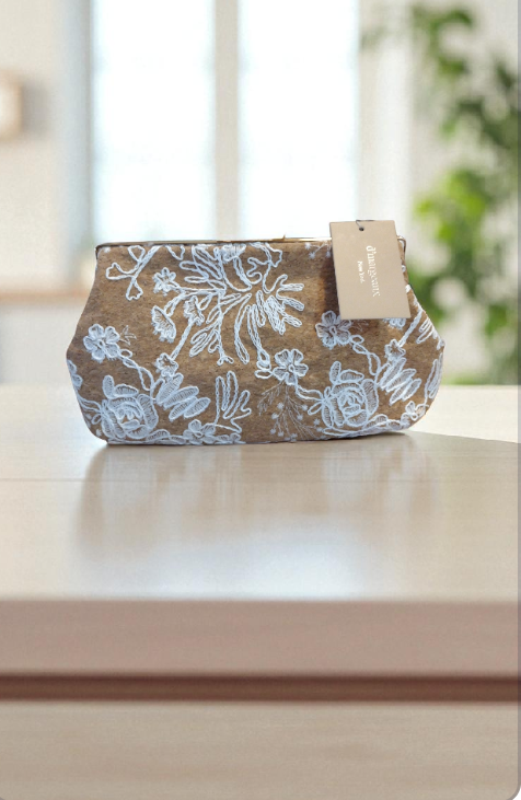 Bolso elegante de mano beige