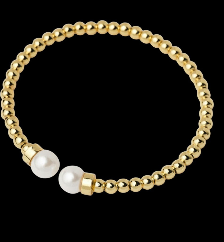 Brazalete de perlas doradas
