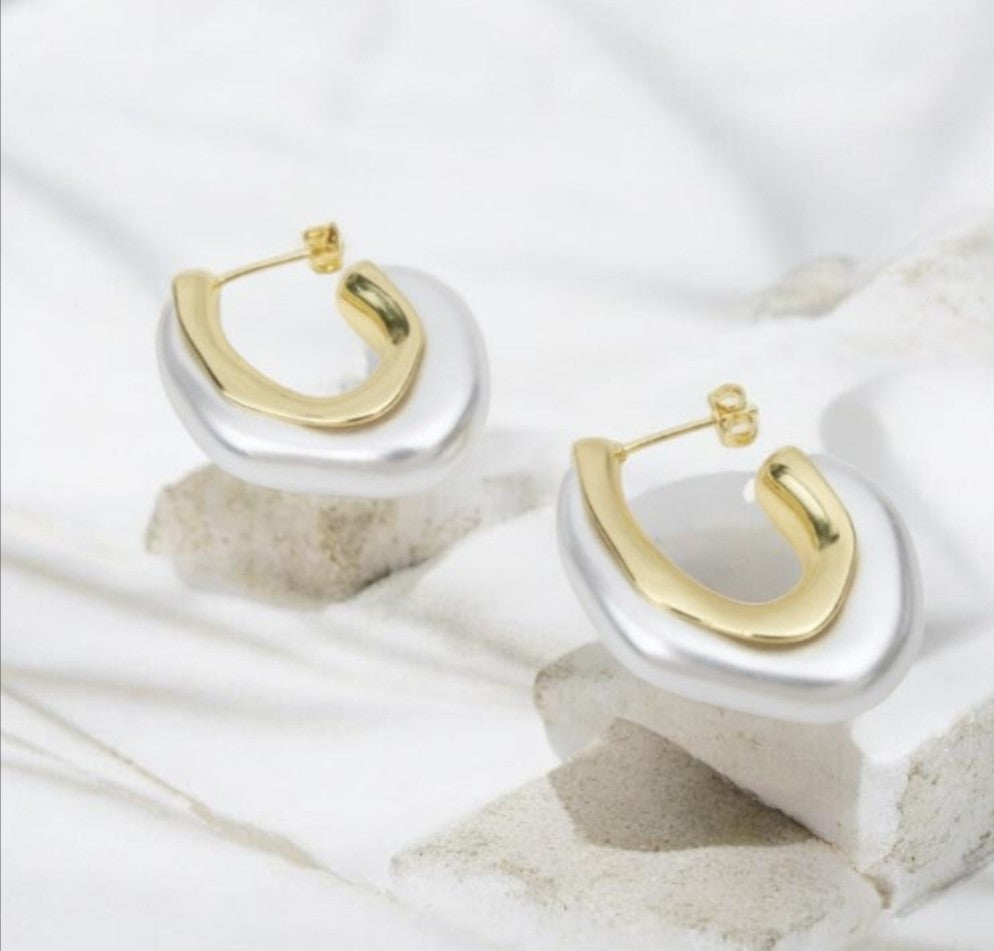 Gold earrings with white ends