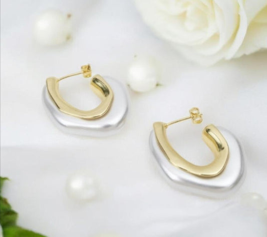 Gold earrings with white ends
