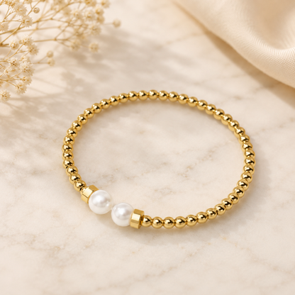Brazalete de perlas doradas