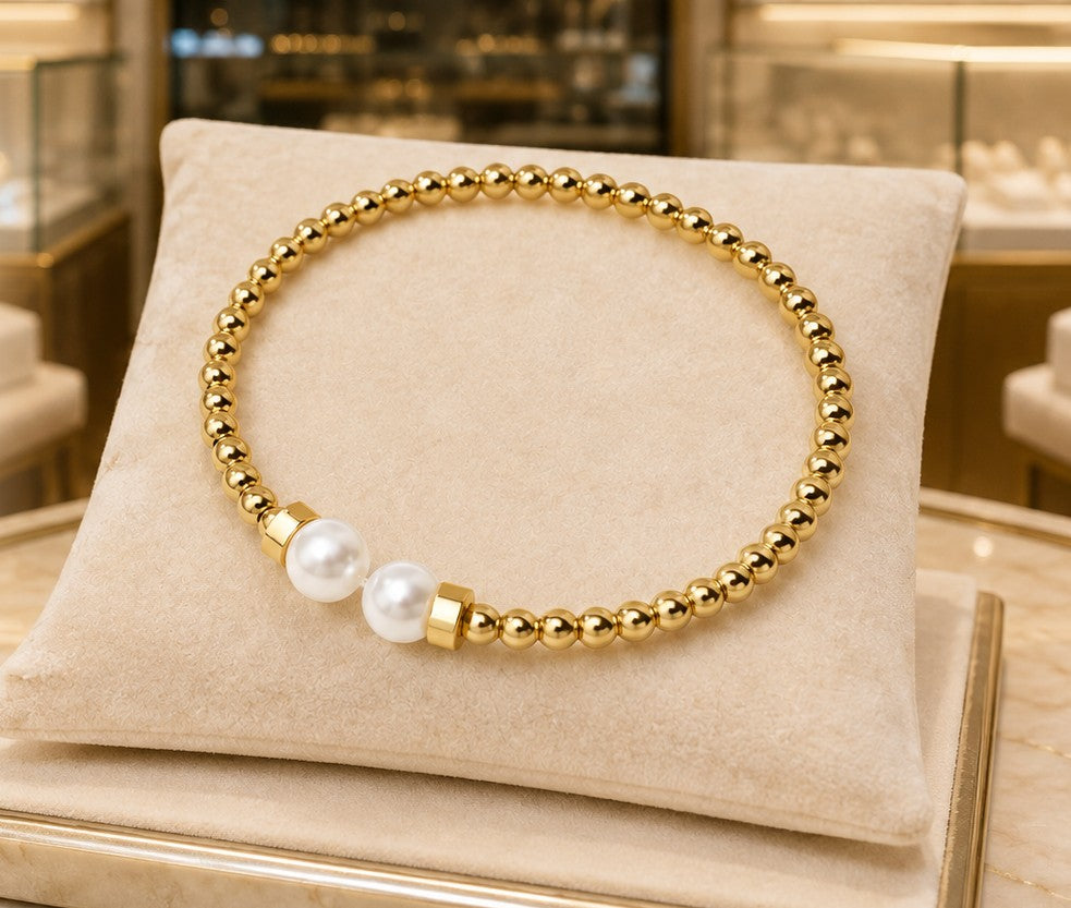 Brazalete de perlas doradas