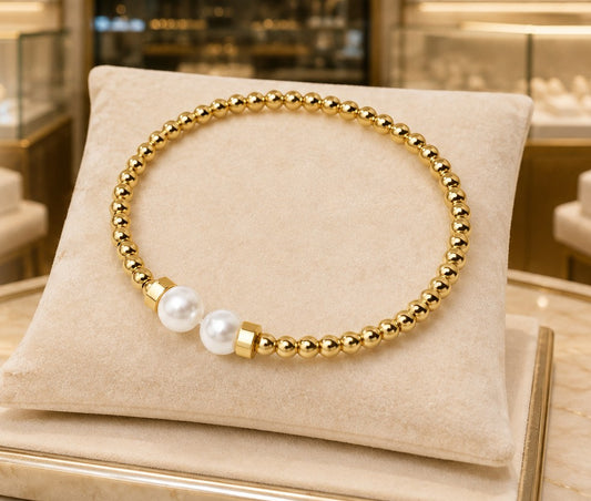 Brazalete de perlas doradas